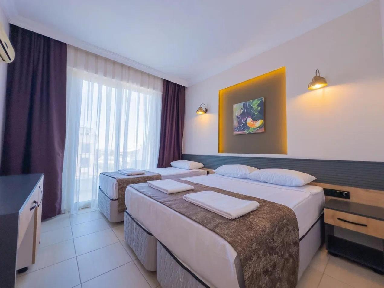 Side Sunset Hotel Bagian luar foto