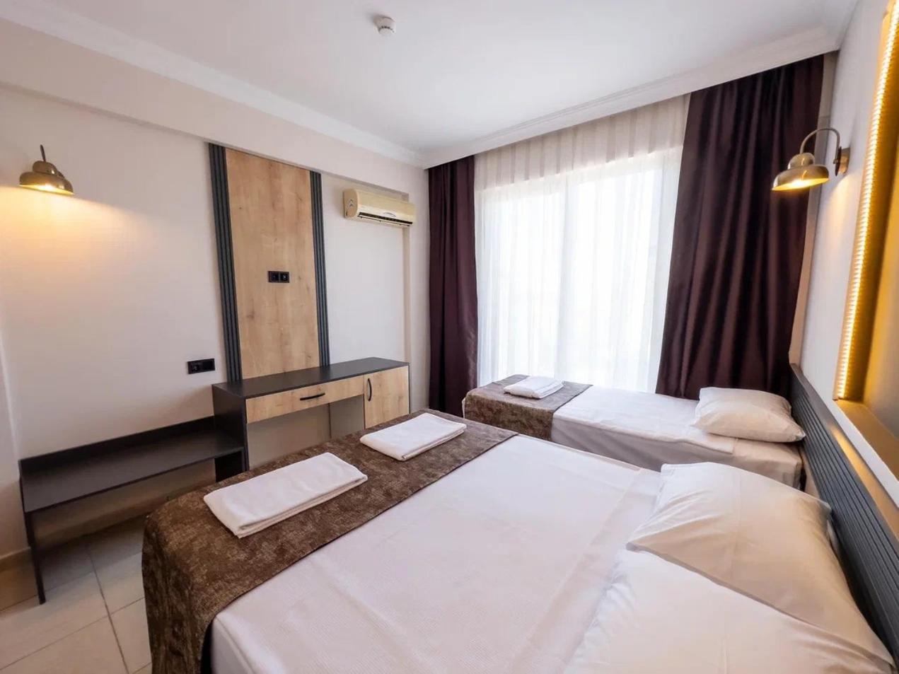 Side Sunset Hotel Bagian luar foto